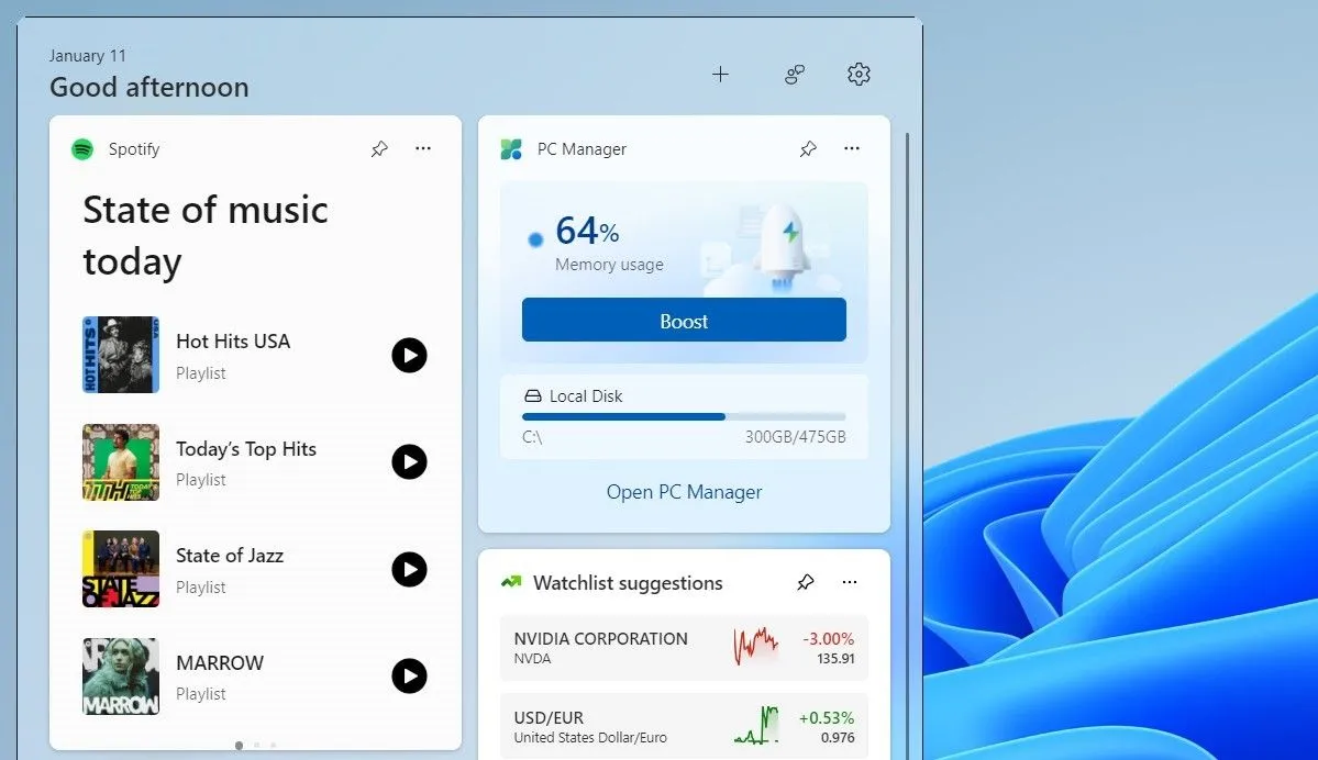 Bảng Widgets của Windows 11 hiển thị ứng dụng Spotify, minh họa sự hiện diện của các ứng dụng tích hợp sẵn.