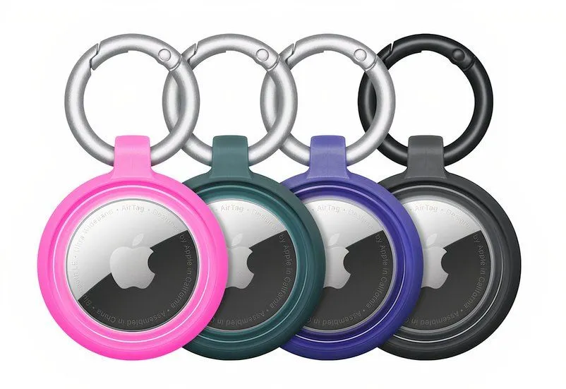 AirTags in multicolor cases.