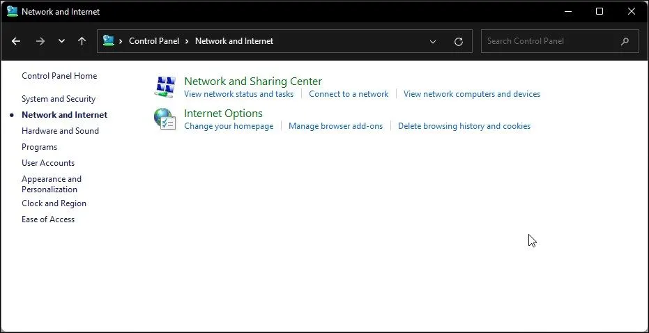 Giao diện Control Panel của Windows 11 hiển thị đường dẫn đến mục Network and Internet và Internet Options.