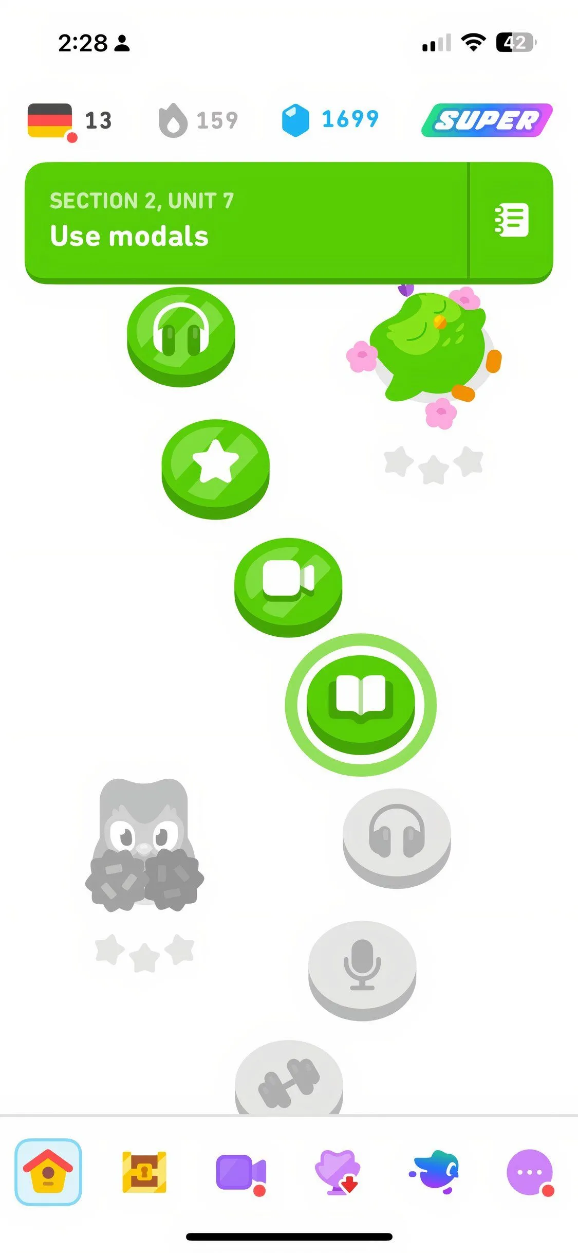 Màn hình trò chơi học ngôn ngữ trong ứng dụng Duolingo, hiển thị bài tập điền từ